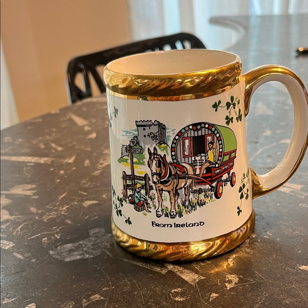 Gold-Trim Ceramic Mug with Green Shamrock & Wagon Illustration